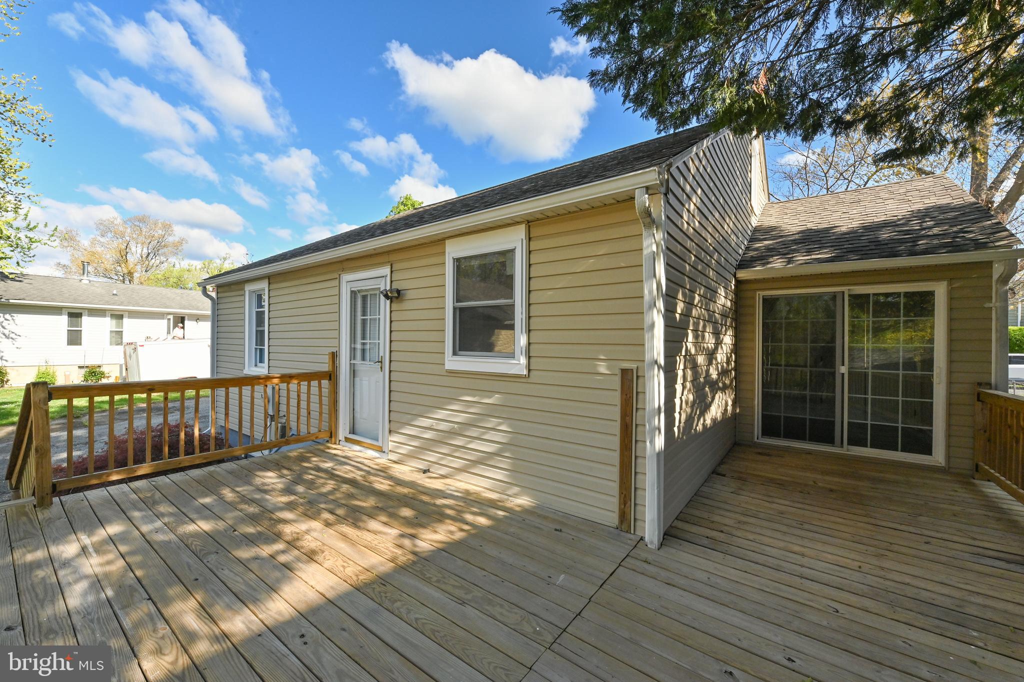313 Orchard Road Edgewater, MD 21037 - Photo 4 of 48 a view of a house with a large window
