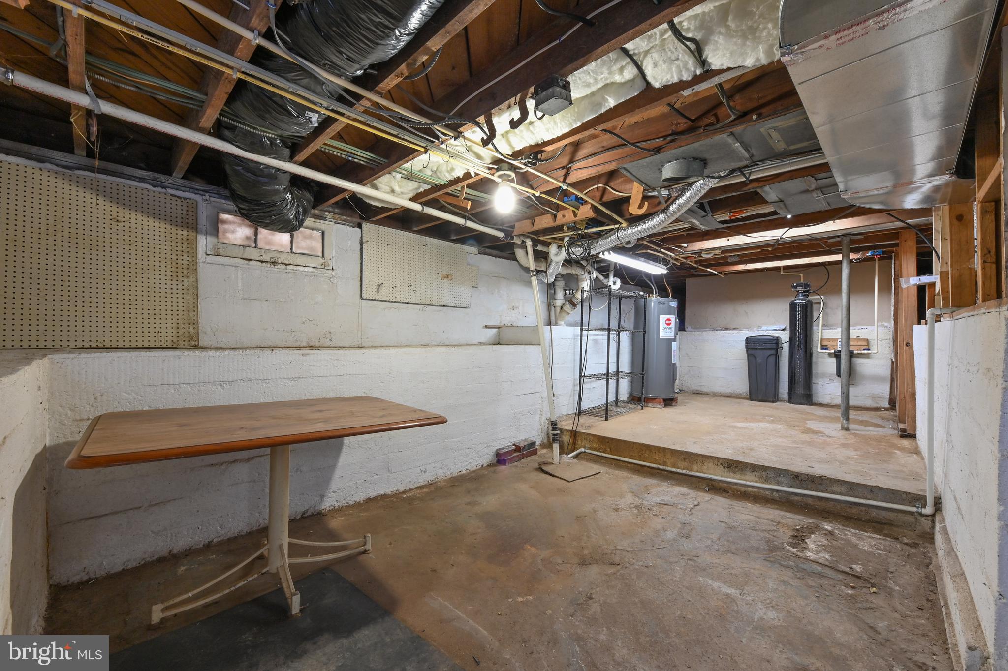 313 Orchard Road Edgewater, MD 21037 - Photo 42 of 48 a room with a bed and a chair