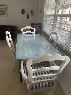 a bathroom with a toilet sink and shower