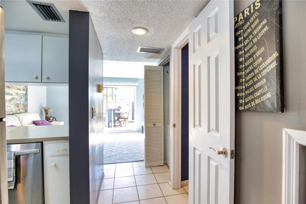 744 Cadiz Road, Unit 2 Venice, FL 34285 - Photo 23 of 26 a view of a kitchen from the hallway