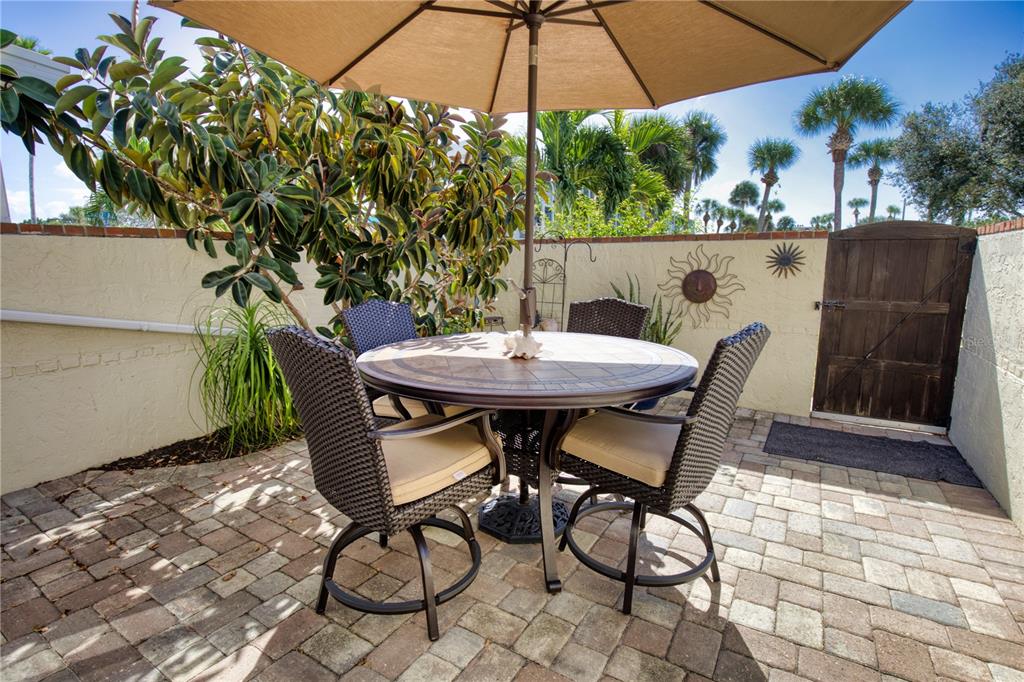 744 Cadiz Road, Unit 2 Venice, FL 34285 - Photo 10 of 26 a view of an outdoor sitting area with furniture