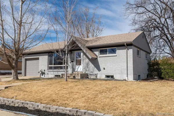 a view of a house with snow on the wall
