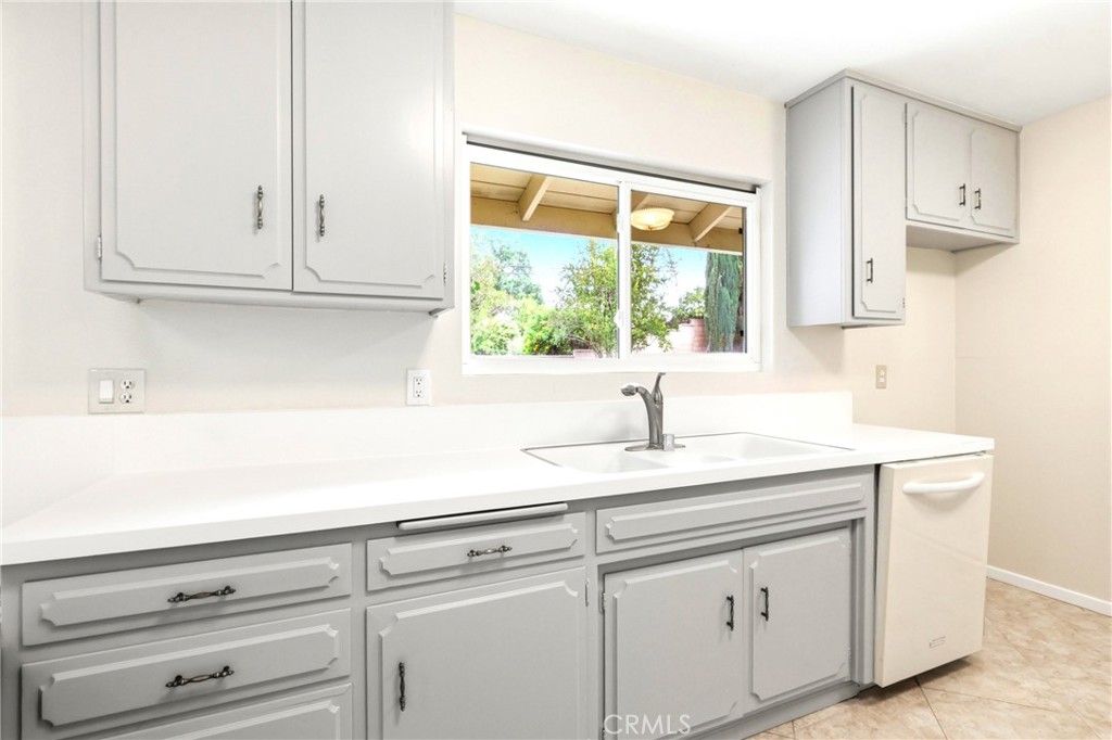 2145 Fairview Avenue Riverside, CA 92506 - Photo 11 of 35 a sink with white cabinets