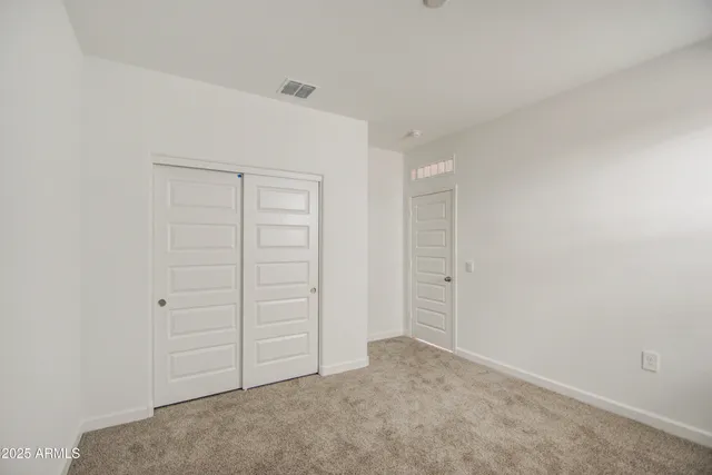an empty room with closet