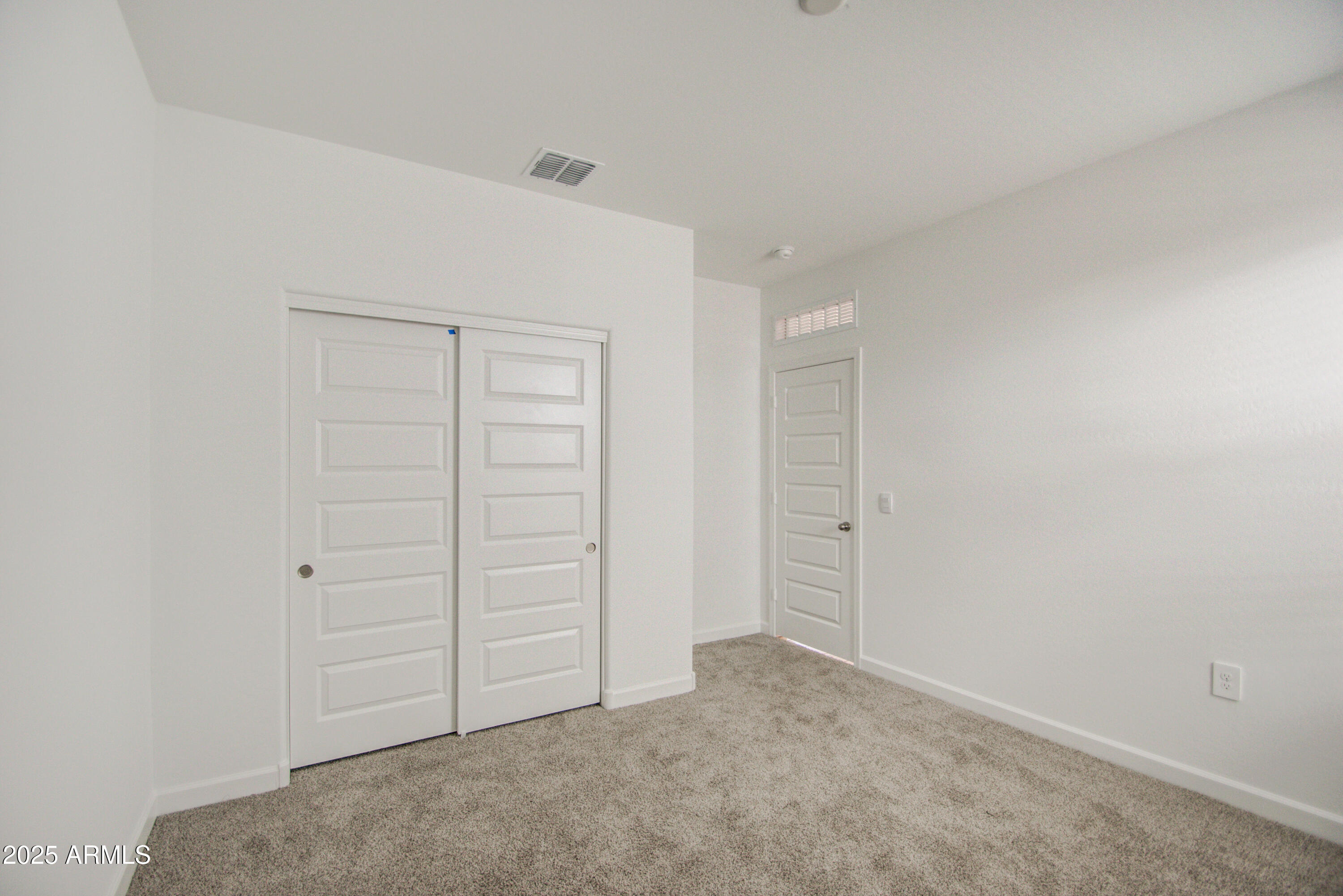 1749 West Stealth Avenue Apache Junction, AZ 85120 - Photo 19 of 48 an empty room with closet