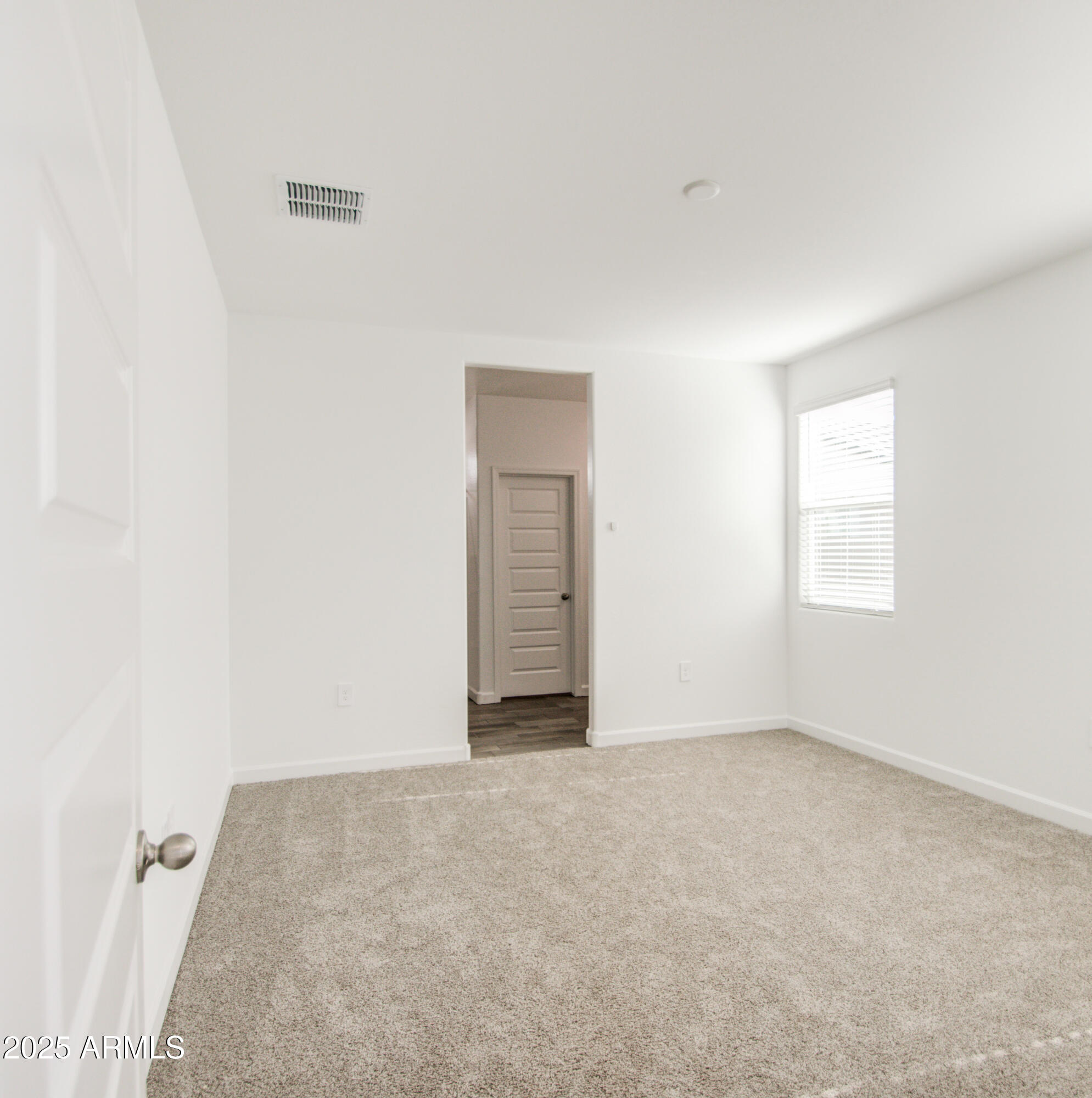 1749 West Stealth Avenue Apache Junction, AZ 85120 - Photo 22 of 48 a view of an empty room and window