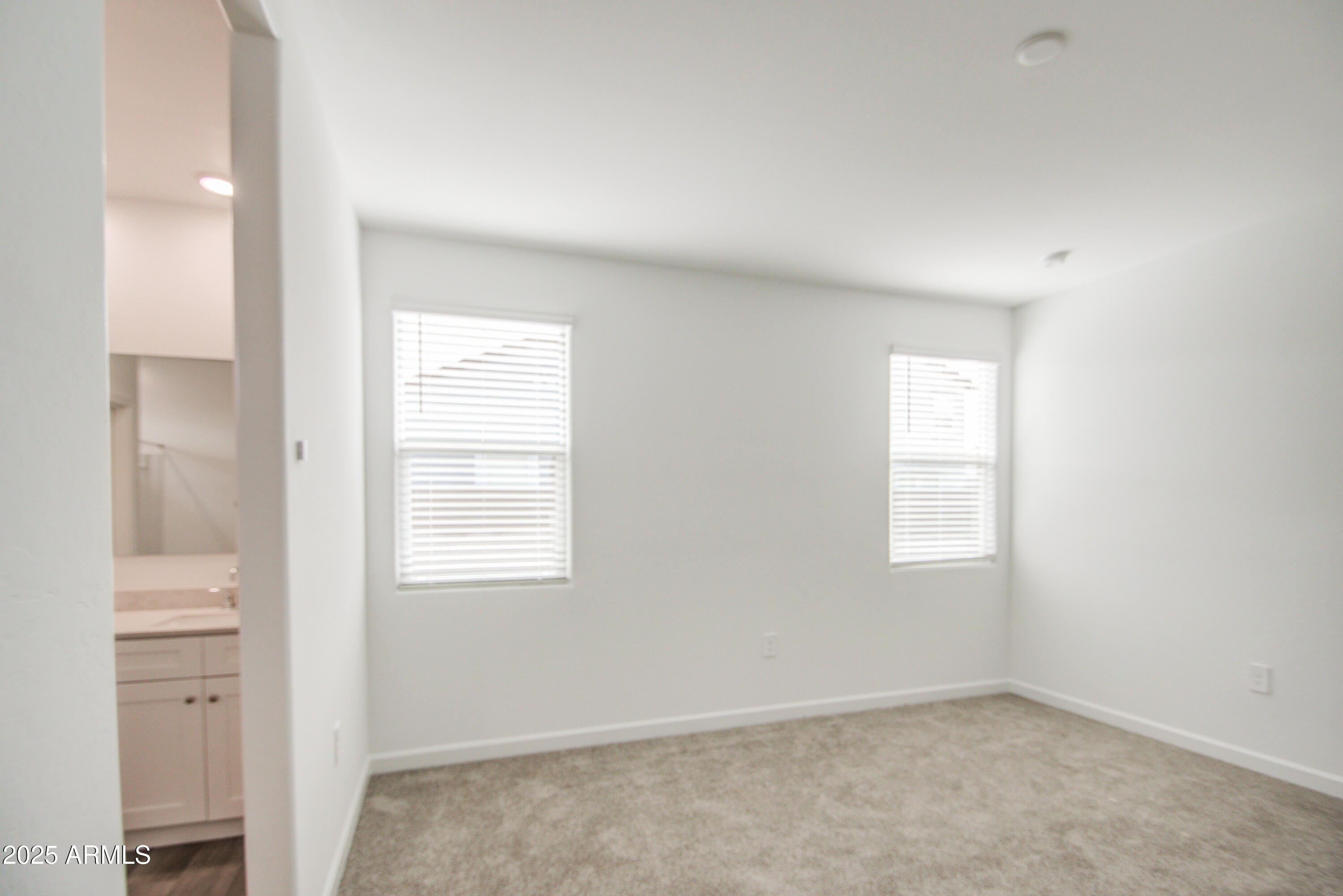 1749 West Stealth Avenue Apache Junction, AZ 85120 - Photo 24 of 48 an empty room with windows