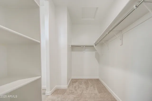 an empty room with a hallway
