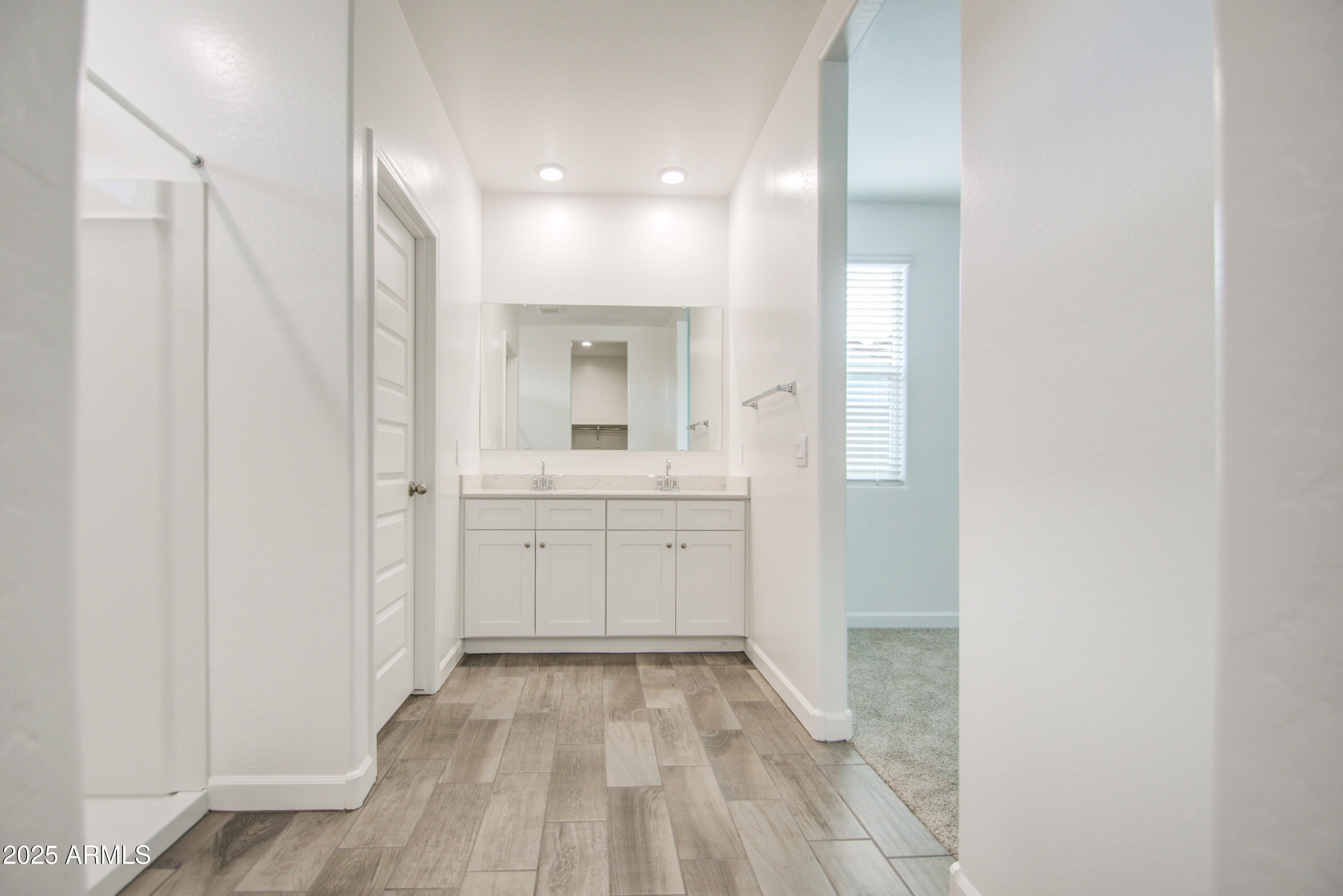 1749 West Stealth Avenue Apache Junction, AZ 85120 - Photo 28 of 48 a bathroom with a sink a toilet a mirror and shower