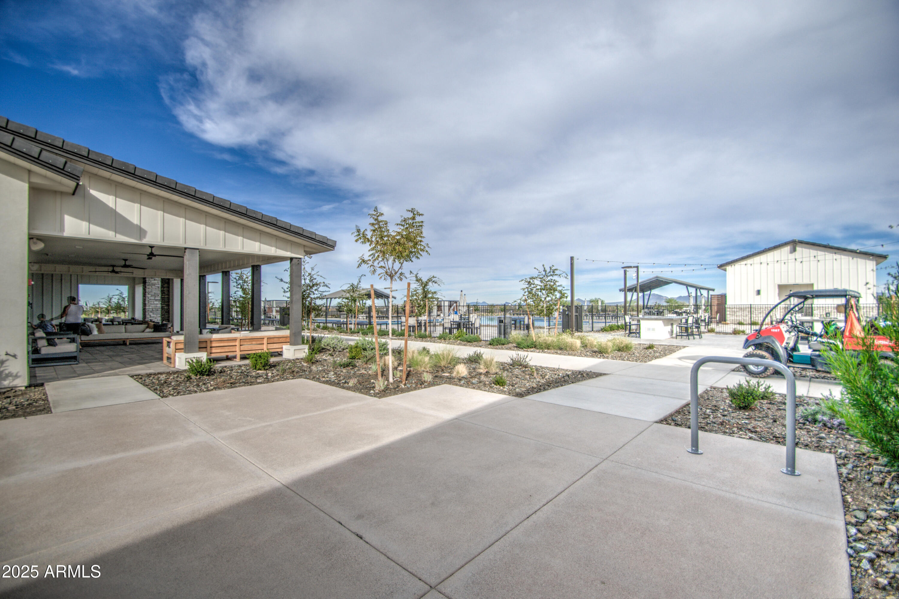 1749 West Stealth Avenue Apache Junction, AZ 85120 - Photo 36 of 48 a view of a patio with table and chairs and potted plants
