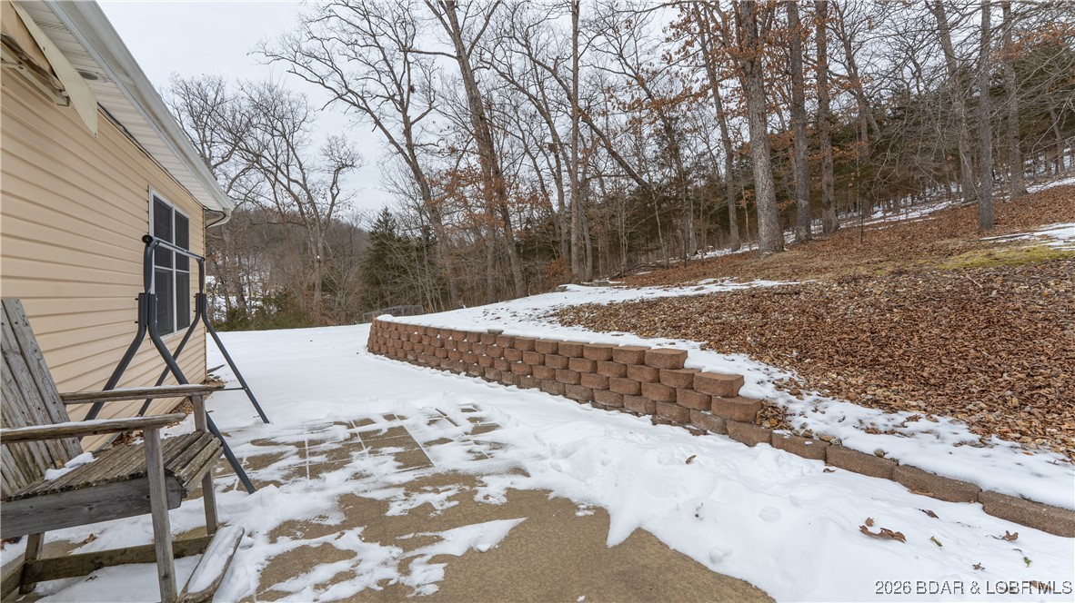 4 Bear Lake Road Eldon, MO 65026 - Photo 16 of 40 Back patio off the dining room
