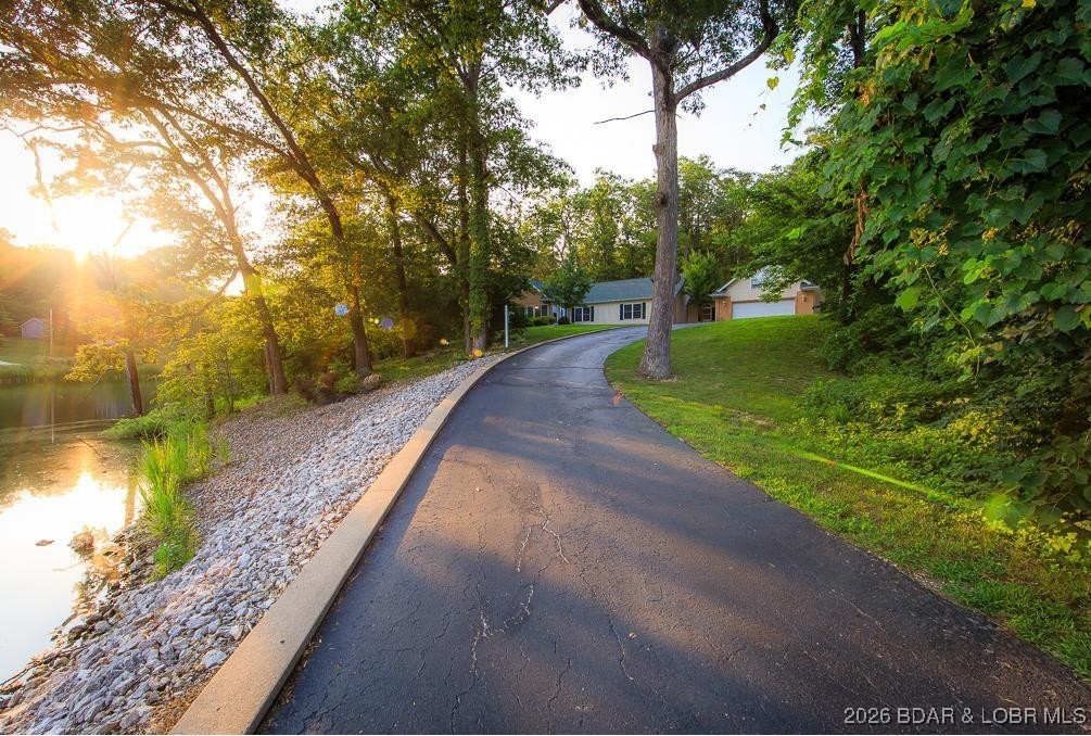 4 Bear Lake Road Eldon, MO 65026 - Photo 2 of 40 This will be your lovely drive to the home once sp