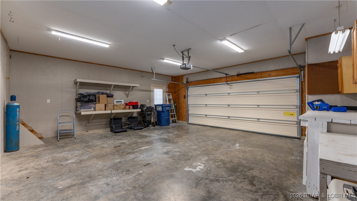 4 Bear Lake Road Eldon, MO 65026 - Photo 31 of 40 Attached 2 car garage includes additional unfinish