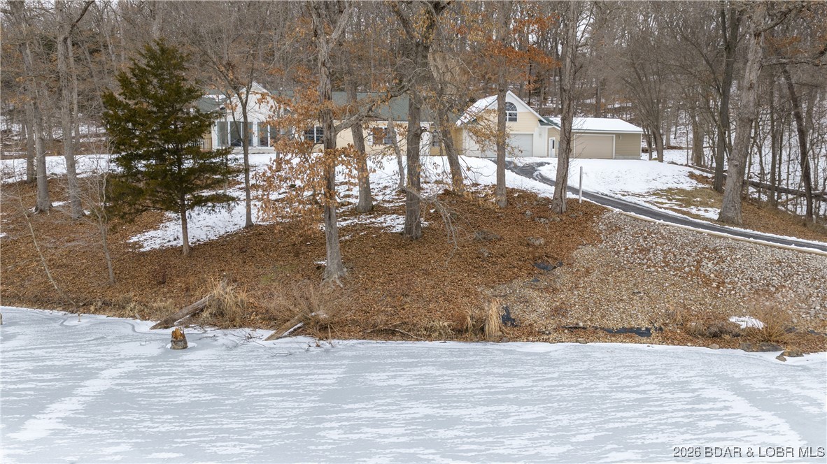 4 Bear Lake Road Eldon, MO 65026 - Photo 38 of 40 View of house from the lake