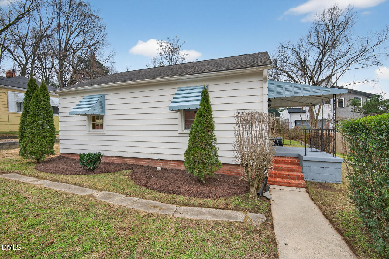 802 Cox Avenue Durham, NC 27701 - Photo 39 of 41 a front view of a house with garden
