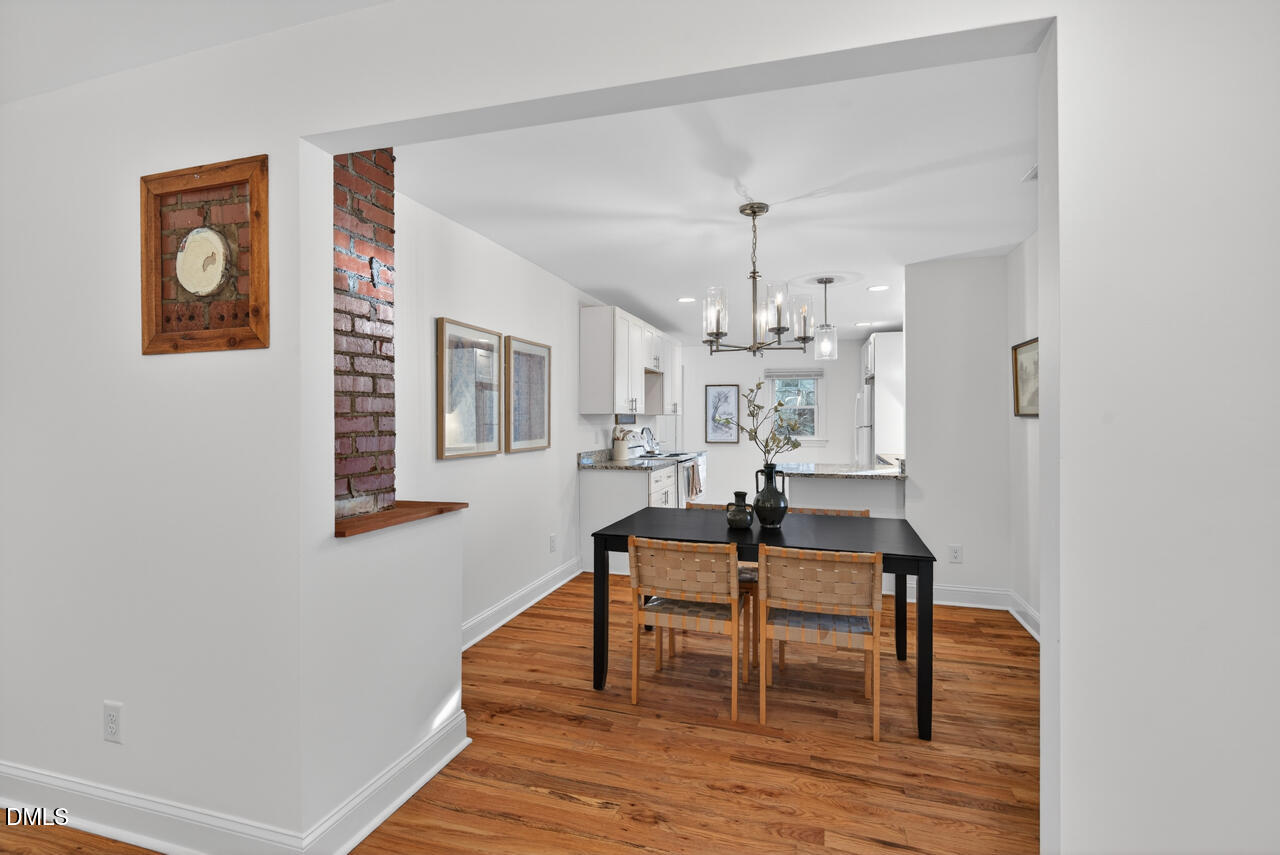802 Cox Avenue Durham, NC 27701 - Photo 9 of 41 a living room with furniture and a wooden floor