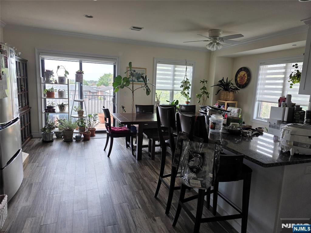 527 Roff Avenue, Unit B Palisades Park, NJ 07650 - Photo 4 of 11 a very nice looking living room with furniture and a large window