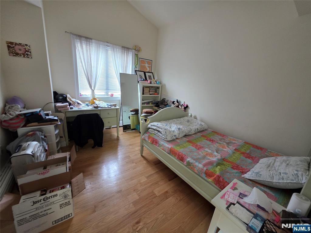 527 Roff Avenue, Unit B Palisades Park, NJ 07650 - Photo 8 of 11 a living room with furniture and a window