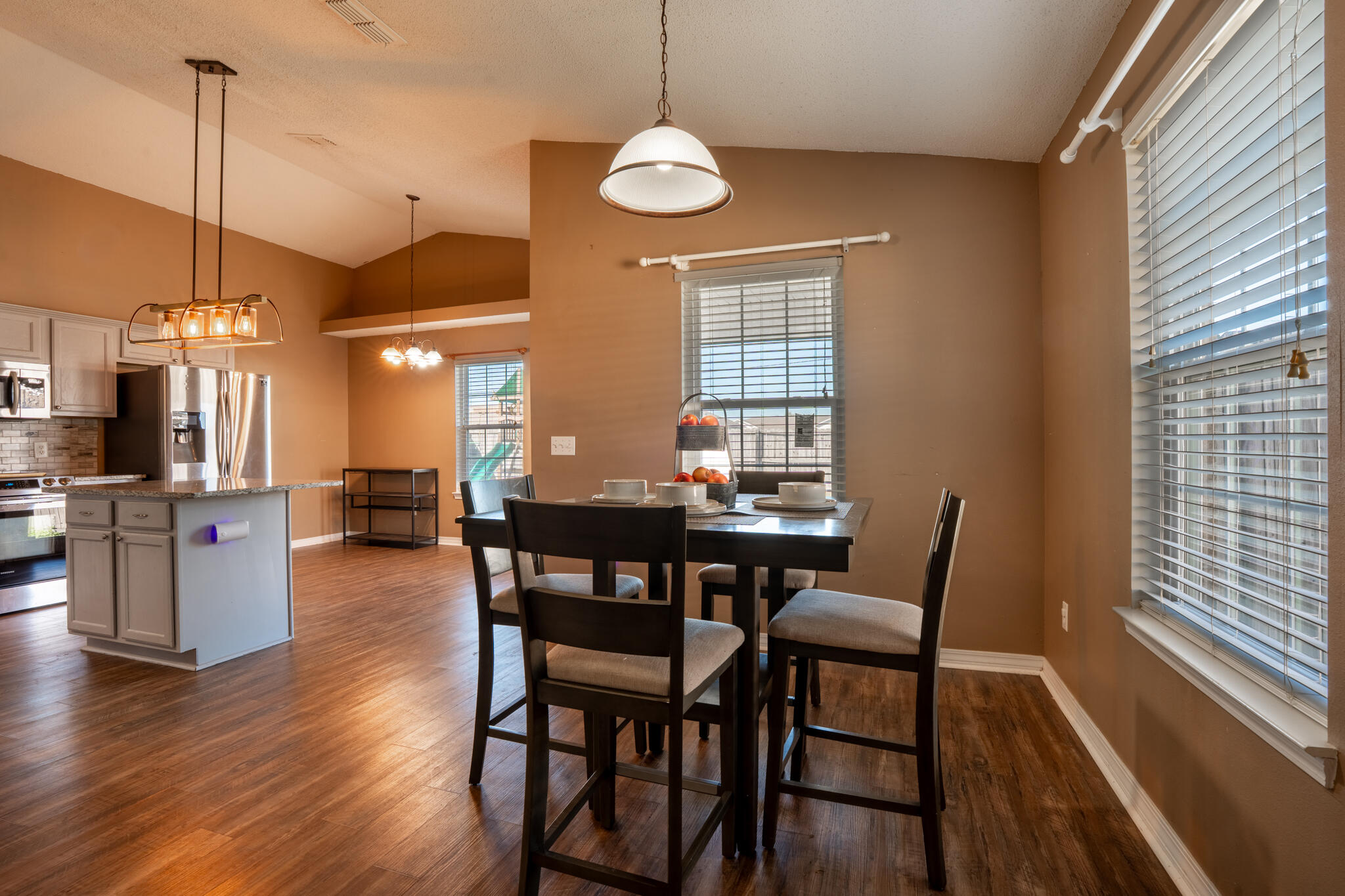 104 Sandstone Trail Crestview, FL 32539 - Photo 11 of 41 a view of a dining room with furniture window and wooden floor