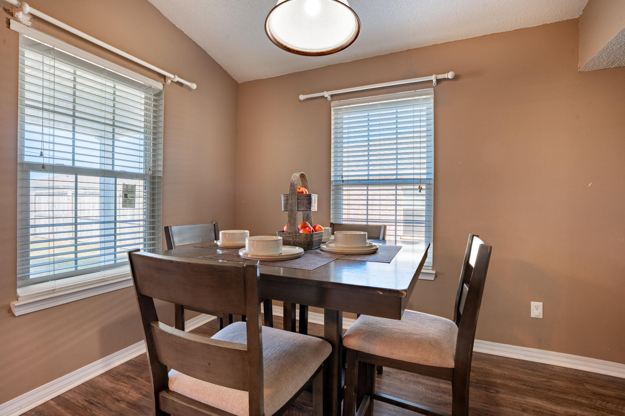 104 Sandstone Trail Crestview, FL 32539 - Photo 16 of 41 a view of a dining room with a table and chairs