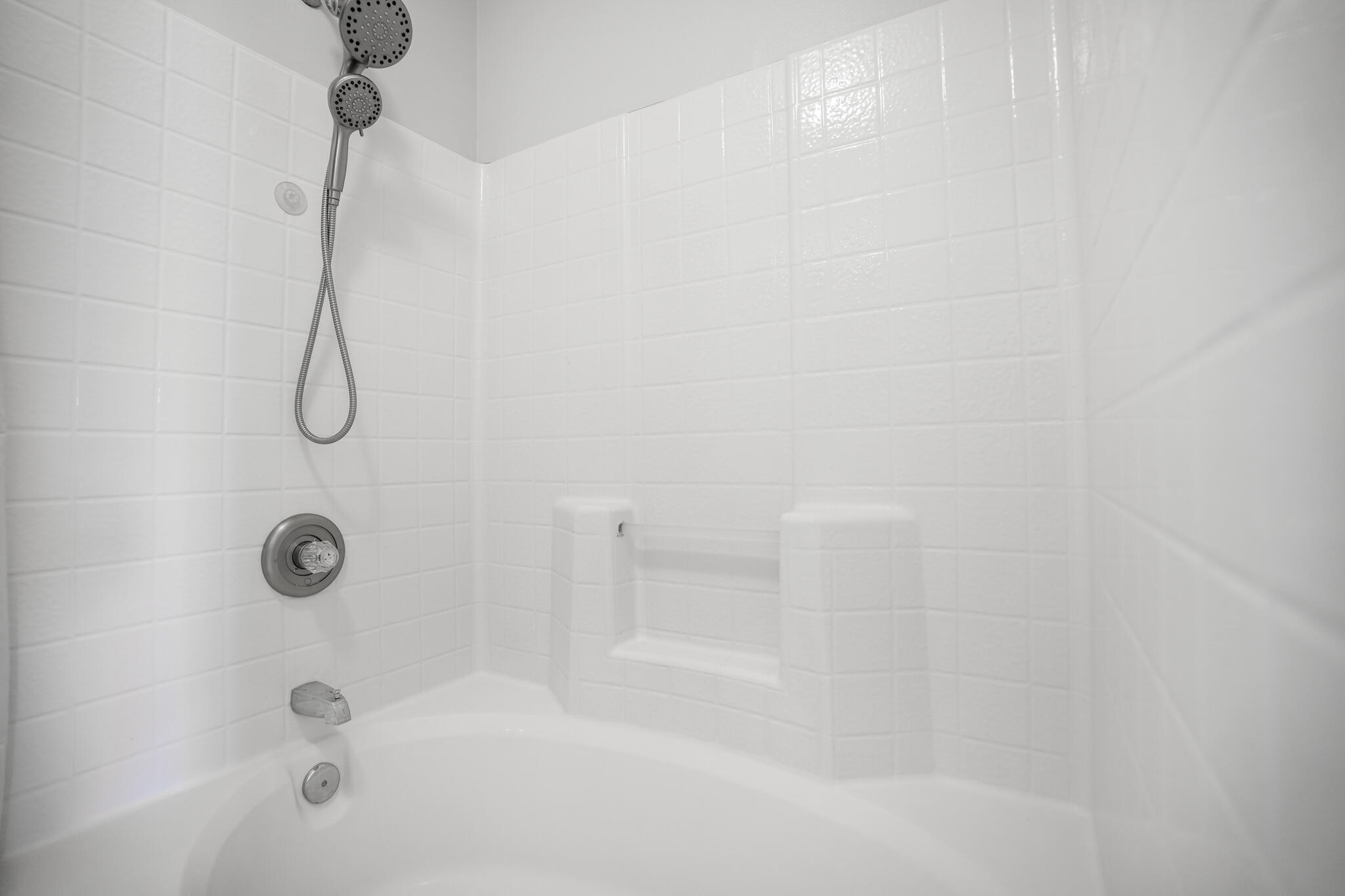 104 Sandstone Trail Crestview, FL 32539 - Photo 26 of 41 a bathroom with a bath tub with a shower