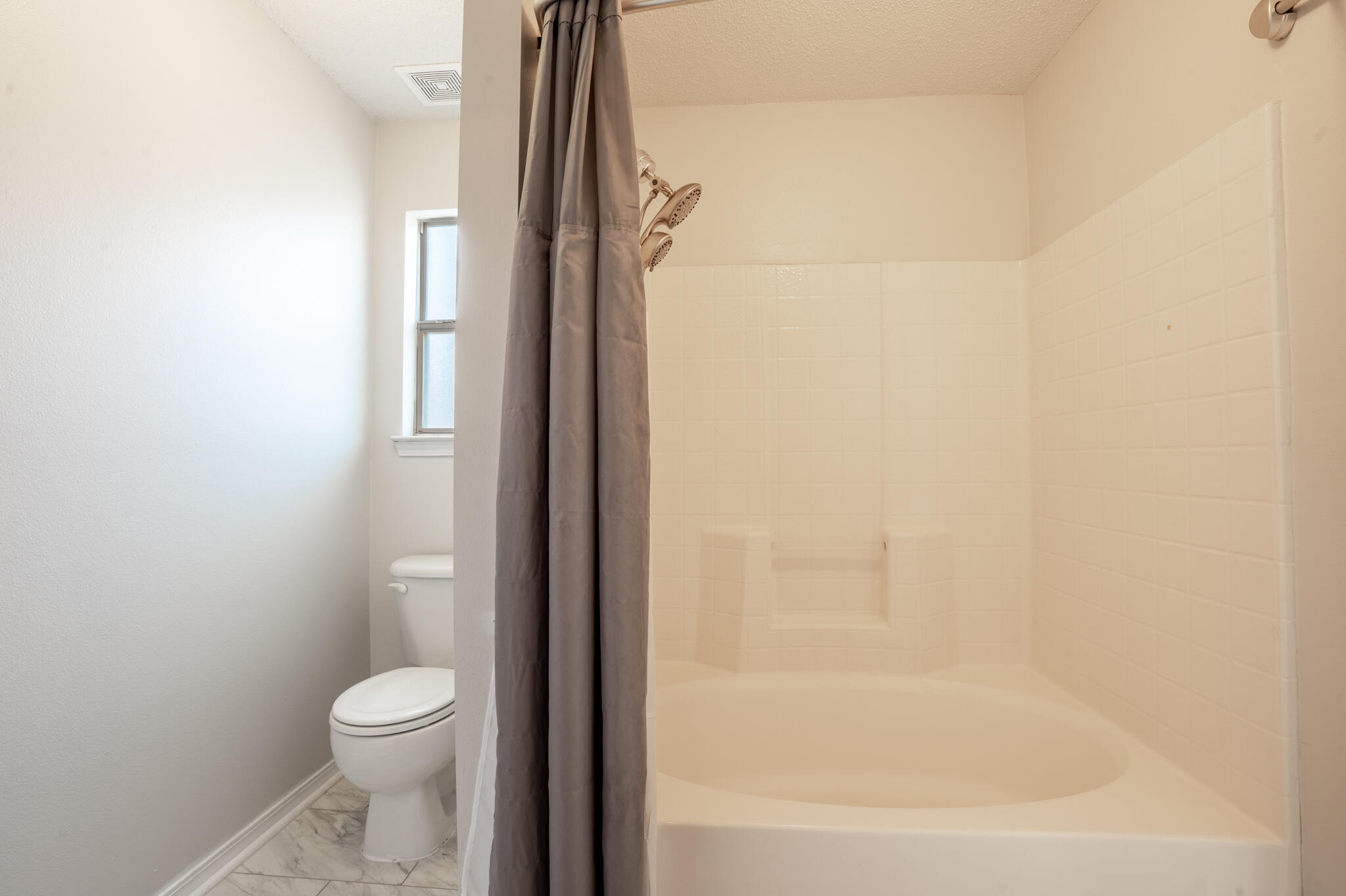 104 Sandstone Trail Crestview, FL 32539 - Photo 27 of 41 a bathroom with a toilet and a shower