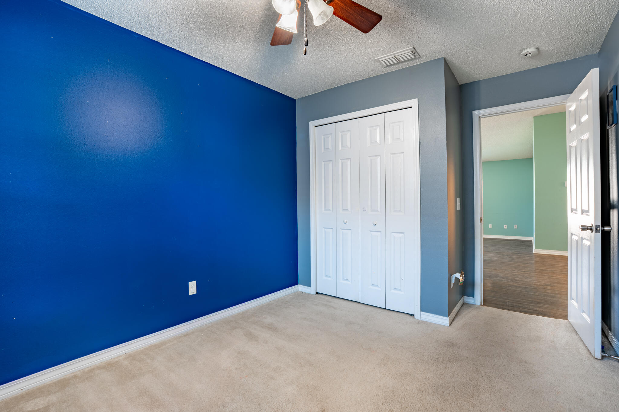 104 Sandstone Trail Crestview, FL 32539 - Photo 30 of 41 an empty room with a ceiling fan and a window
