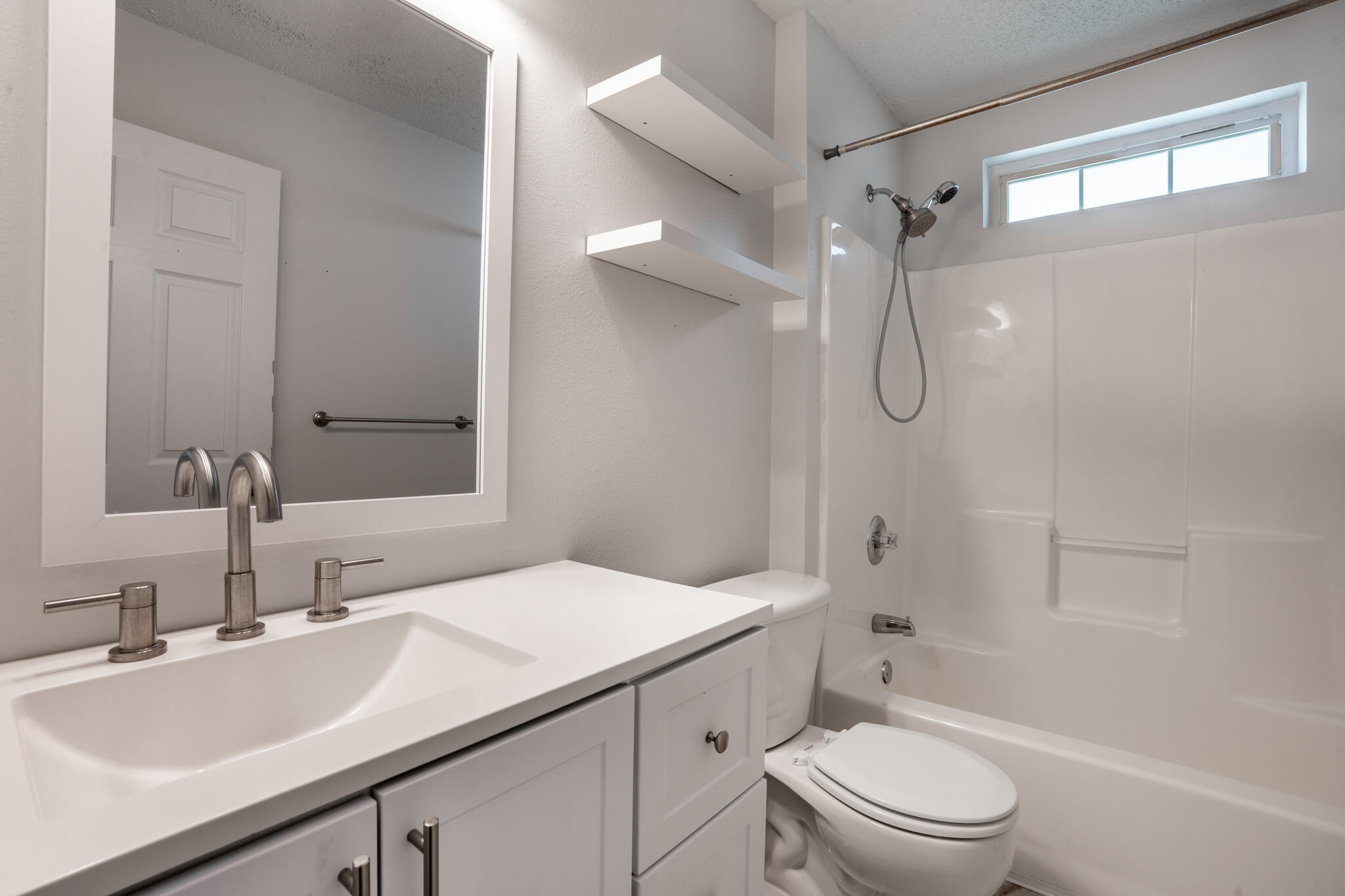 104 Sandstone Trail Crestview, FL 32539 - Photo 34 of 41 a bathroom with a sink a toilet and shower