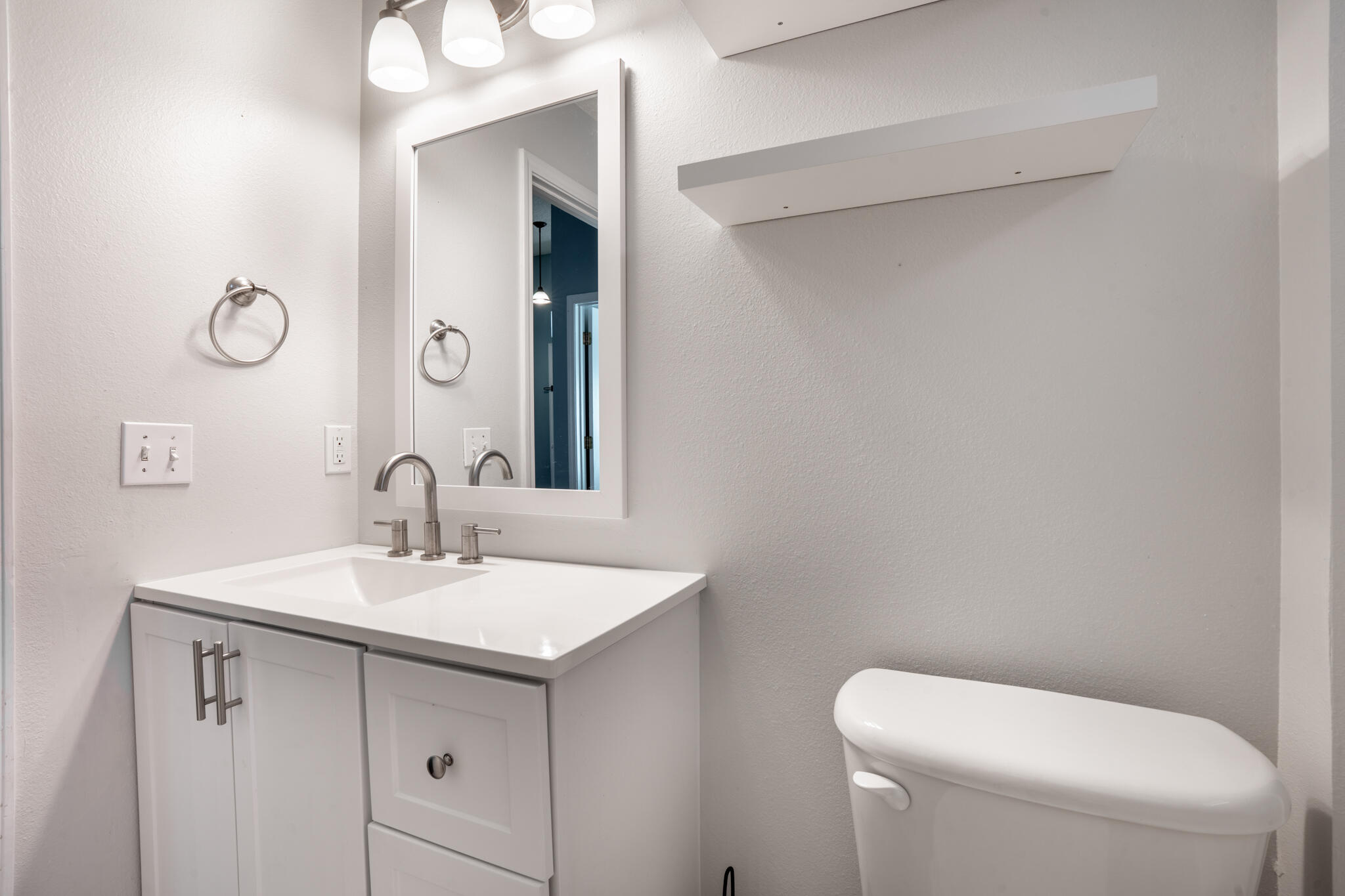 104 Sandstone Trail Crestview, FL 32539 - Photo 36 of 41 a bathroom with a toilet sink and mirror