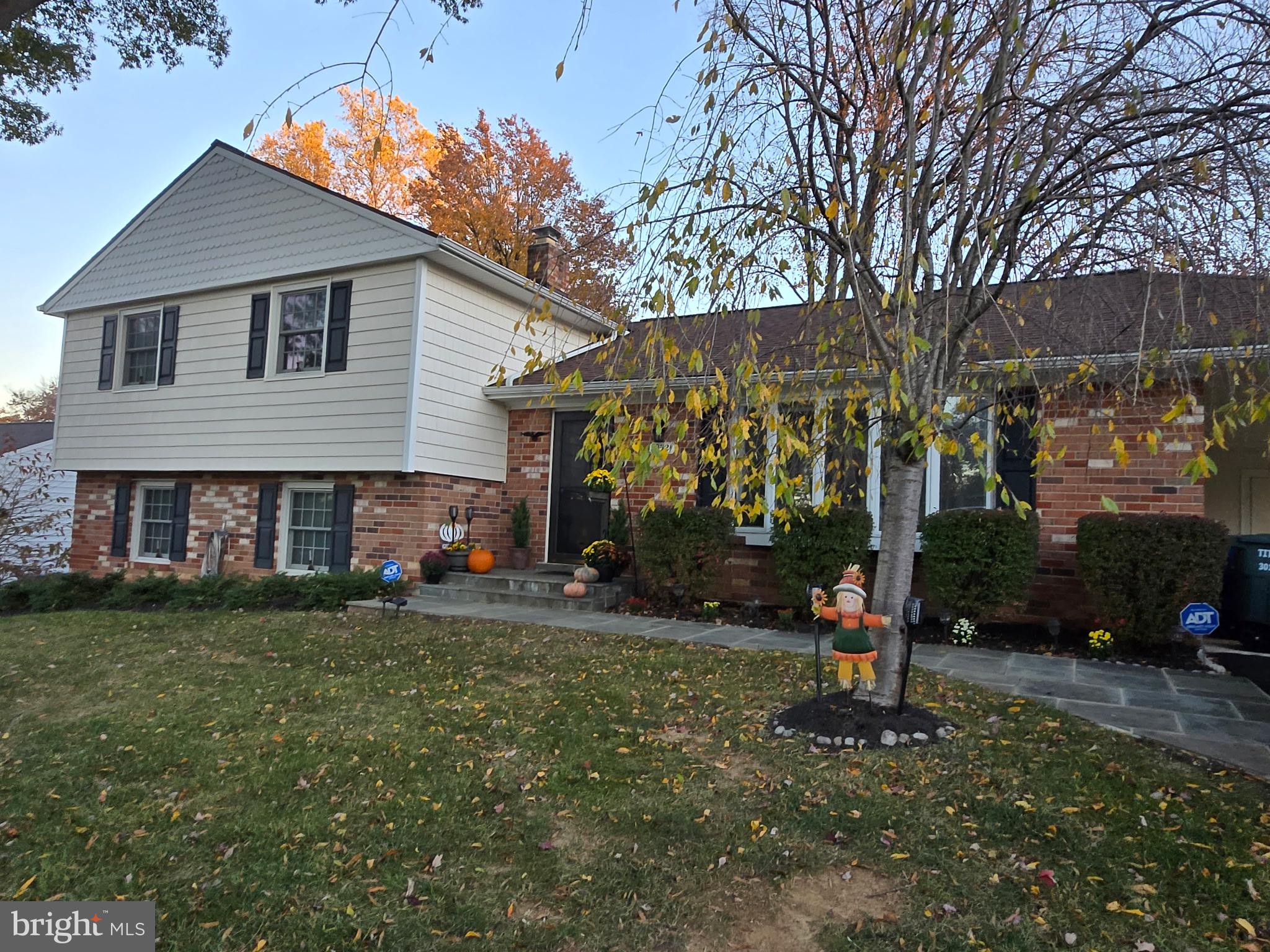 19321 Olney Mill Road Olney, MD 20832 - Photo 5 of 91 a front view of a house with a yard