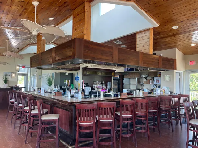 a view of a chairs and table in a patio