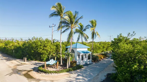 a view of lake with green space