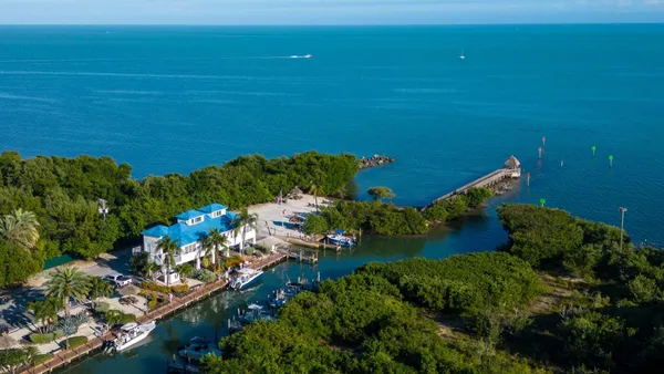 a view of a tables and chairs in a patio