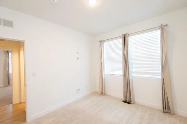 a view of a room with racks on the wall