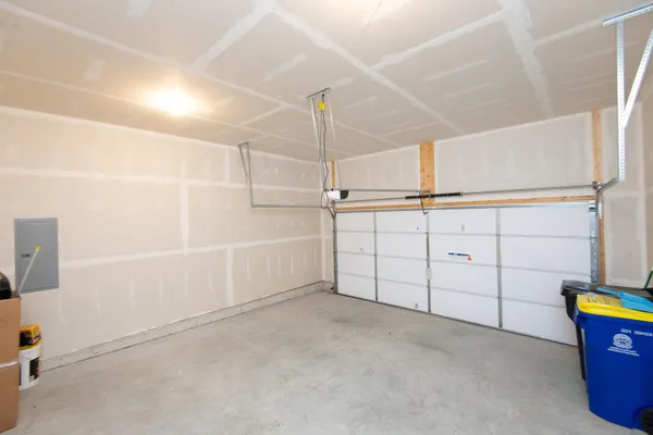 a view of empty room with a fireplace