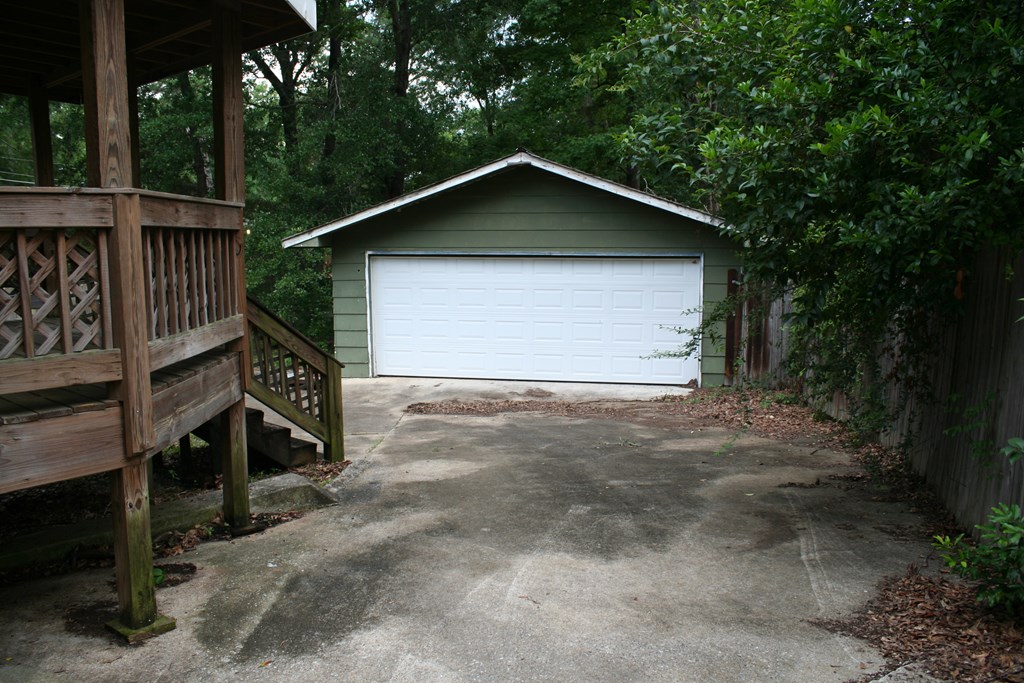 2511 Reese Road Columbus, GA 31907 - Photo 14 of 31 a view of a house with a yard and garage