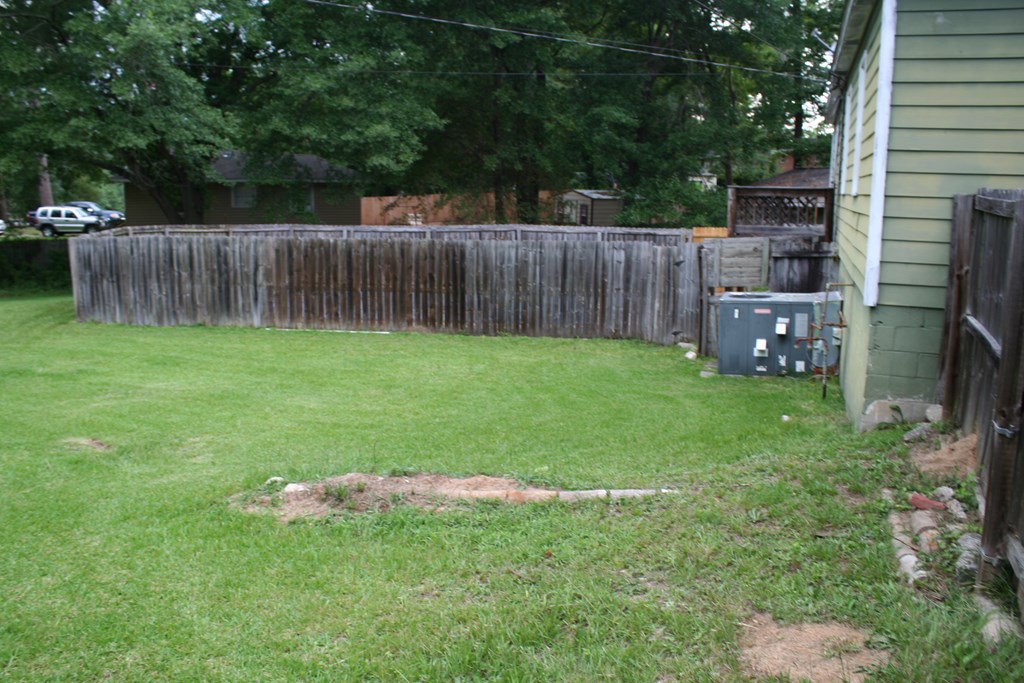 2511 Reese Road Columbus, GA 31907 - Photo 15 of 31 a green field covered with trees in the background