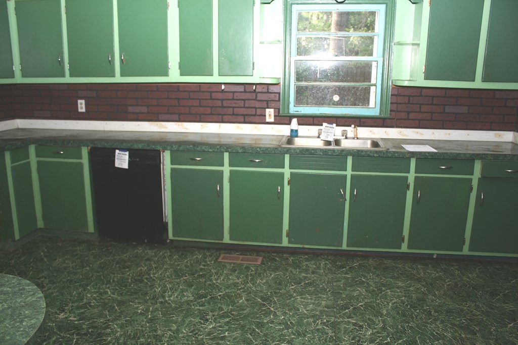 2511 Reese Road Columbus, GA 31907 - Photo 27 of 31 a room with lots of green walls and a window