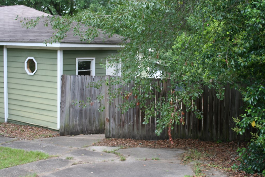 2511 Reese Road Columbus, GA 31907 - Photo 7 of 31 a front view of a house with a garden