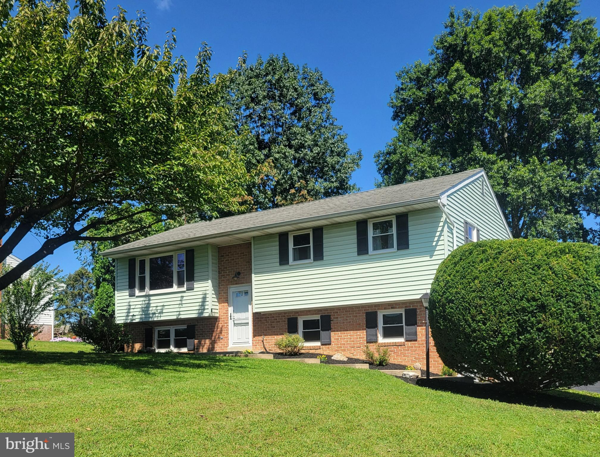 127 West Lexington Road Lititz, PA 17543 - Photo 1 of 48 a front view of house with yard and green space