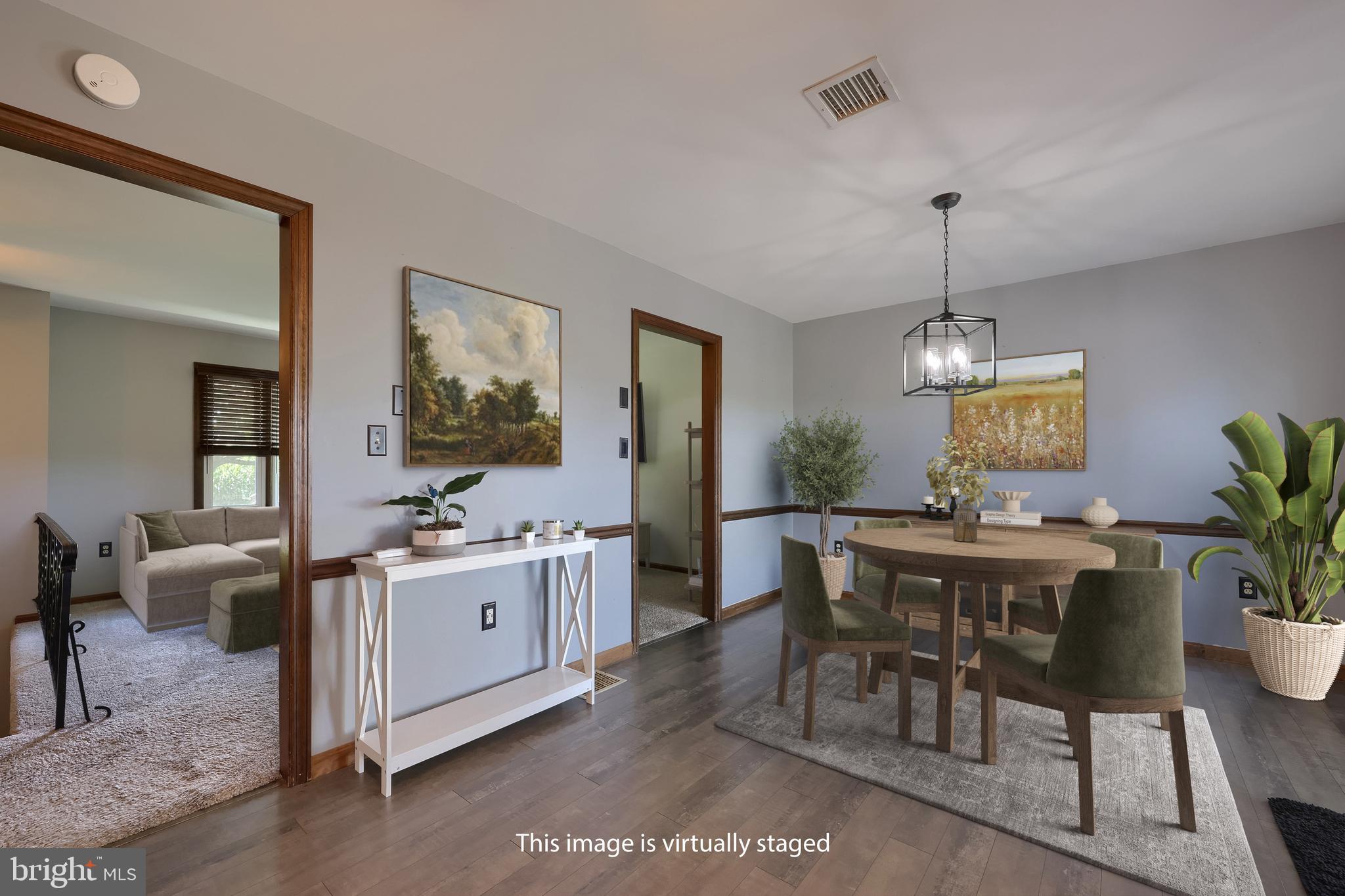 127 West Lexington Road Lititz, PA 17543 - Photo 13 of 48 a view of a dining room with furniture window and wooden floor