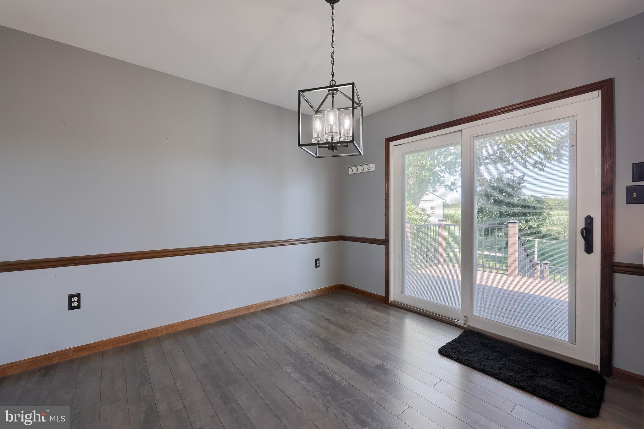 127 West Lexington Road Lititz, PA 17543 - Photo 15 of 48 a view of an empty room with wooden floor and a window