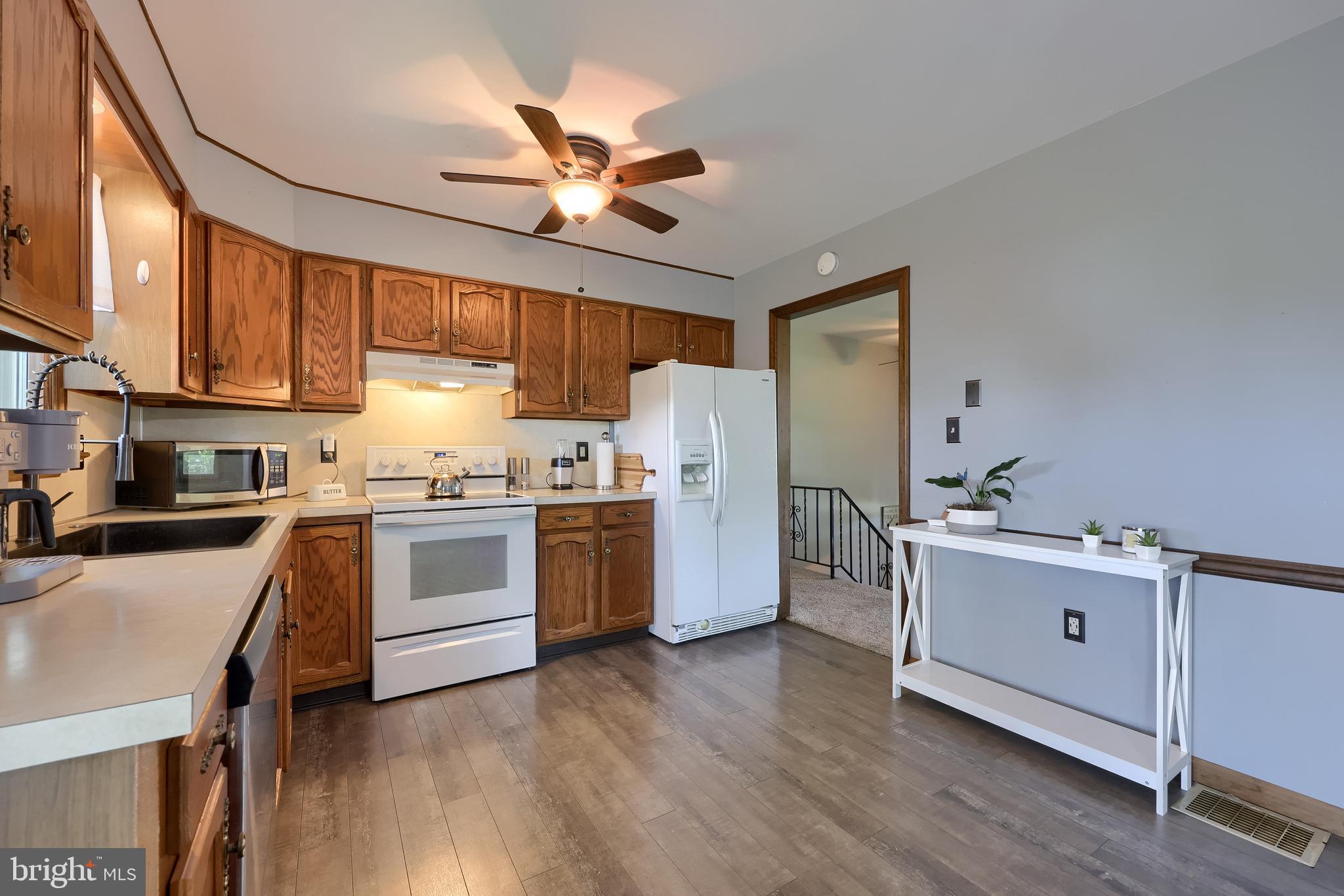 127 West Lexington Road Lititz, PA 17543 - Photo 17 of 48 a kitchen with a cabinets and wooden floor