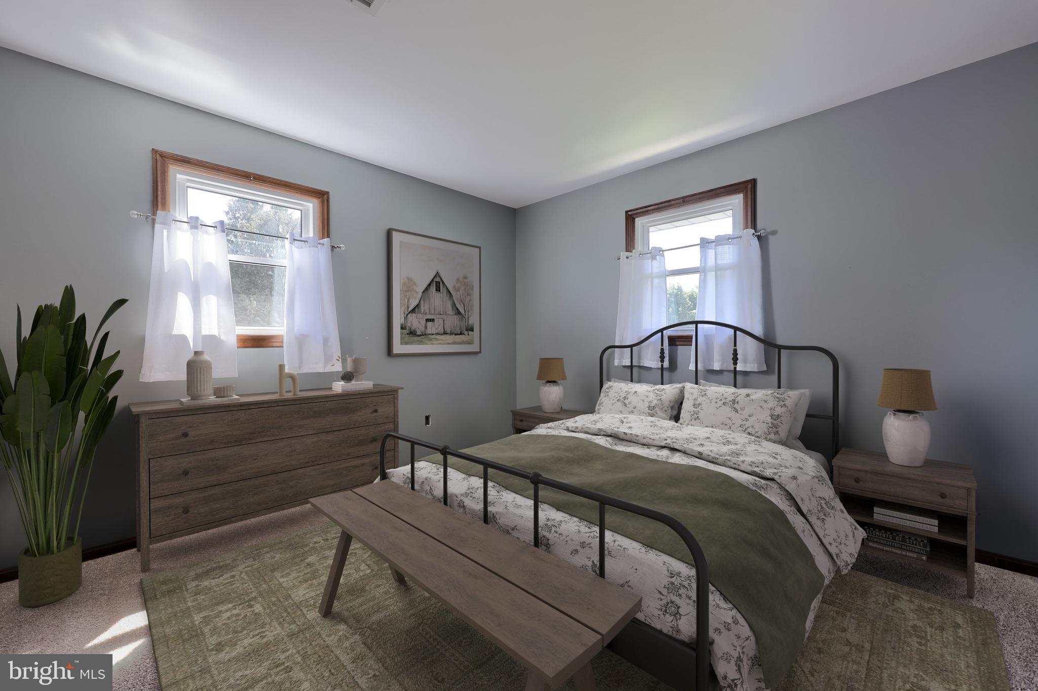 127 West Lexington Road Lititz, PA 17543 - Photo 20 of 48 a bed sitting in a bedroom next to a window