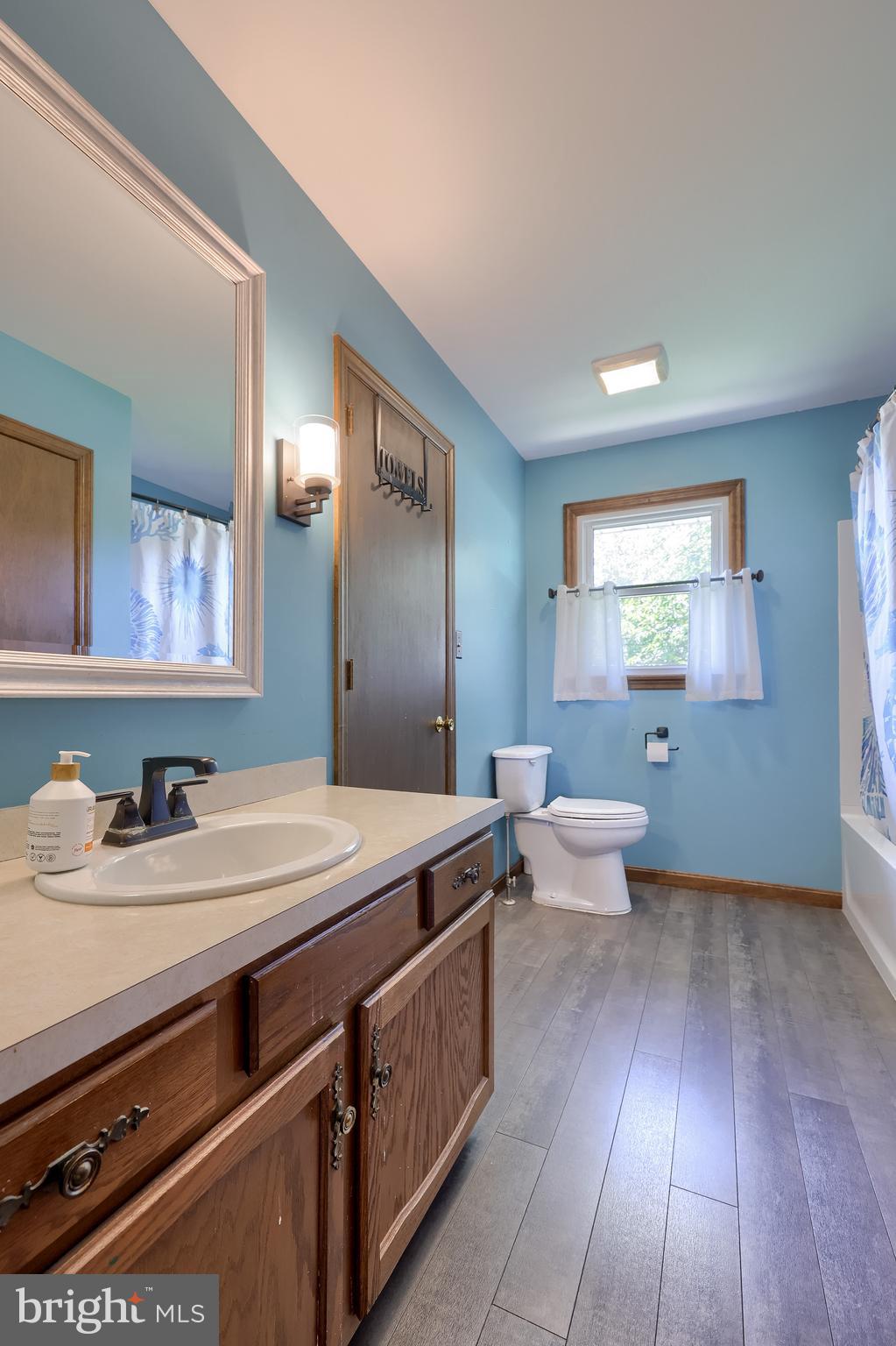 127 West Lexington Road Lititz, PA 17543 - Photo 24 of 48 a spacious bathroom with a granite countertop sink toilet and mirror