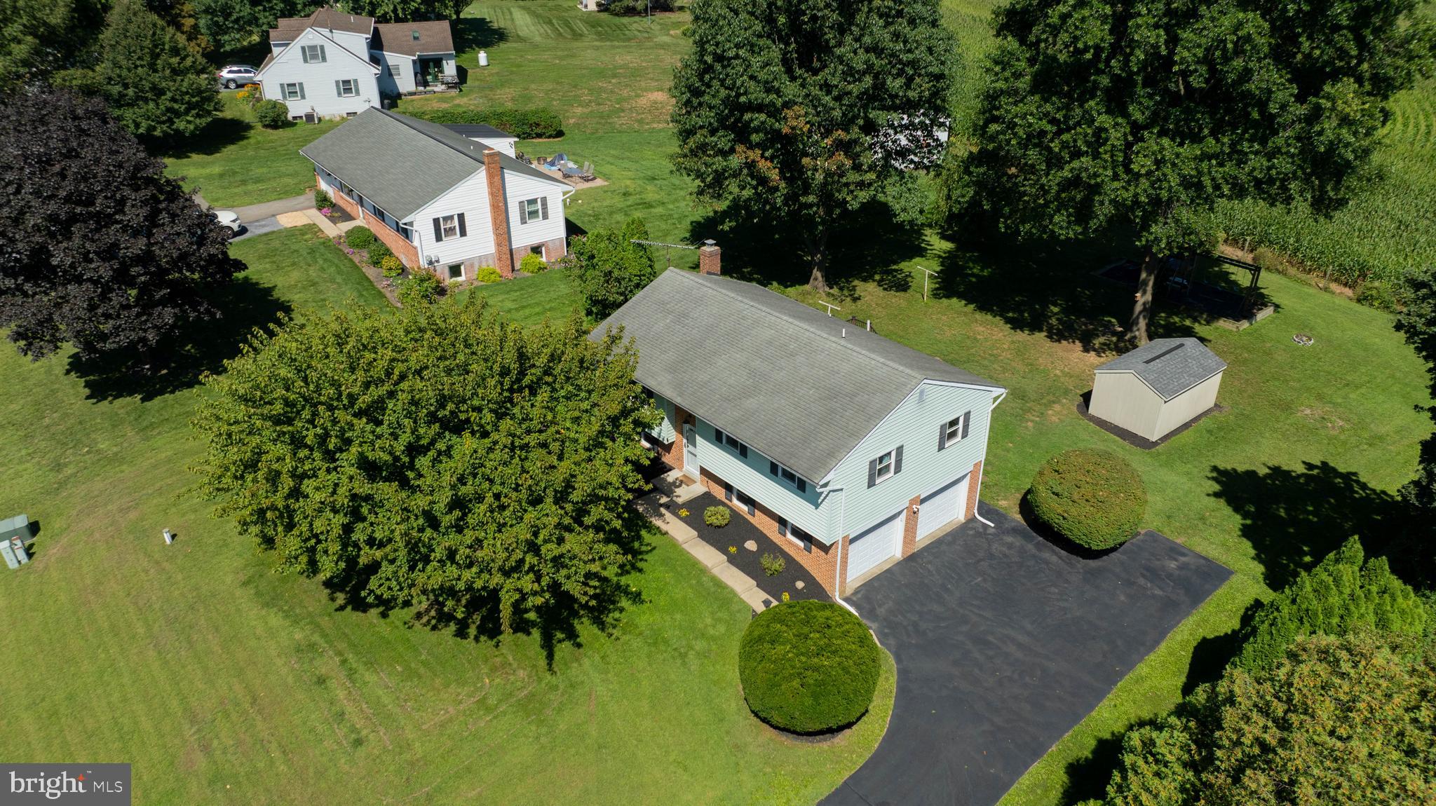 127 West Lexington Road Lititz, PA 17543 - Photo 43 of 48 an aerial view of a house with yard swimming pool and outdoor seating