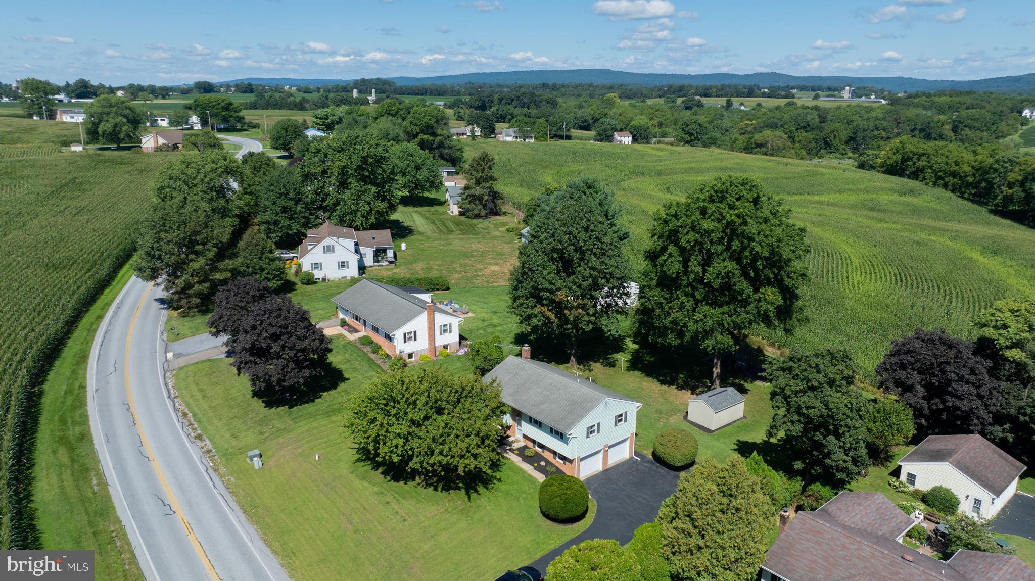 127 West Lexington Road Lititz, PA 17543 - Photo 46 of 48 an aerial view of a house with a yard