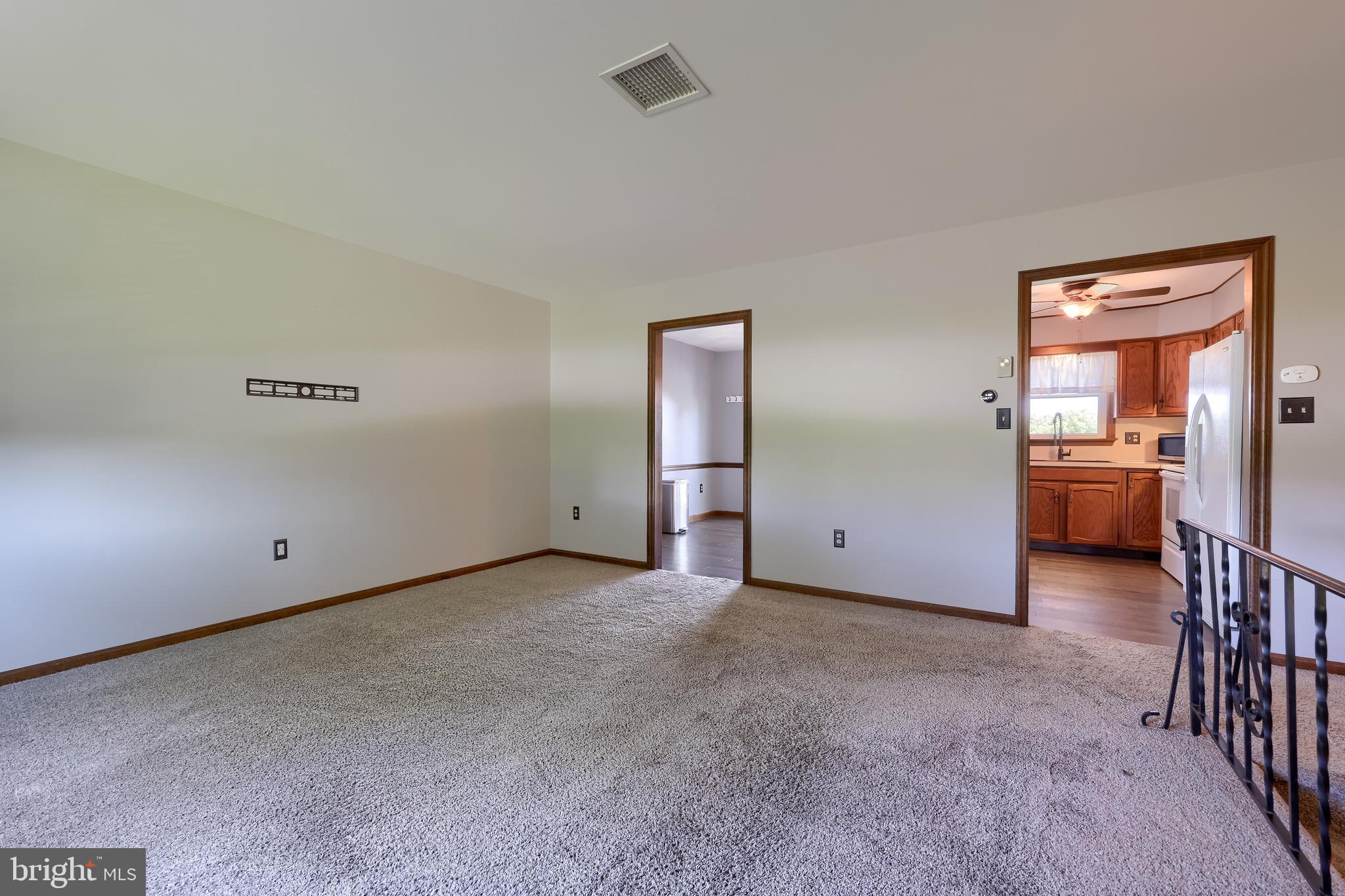 127 West Lexington Road Lititz, PA 17543 - Photo 7 of 48 a view of an empty room and kitchen