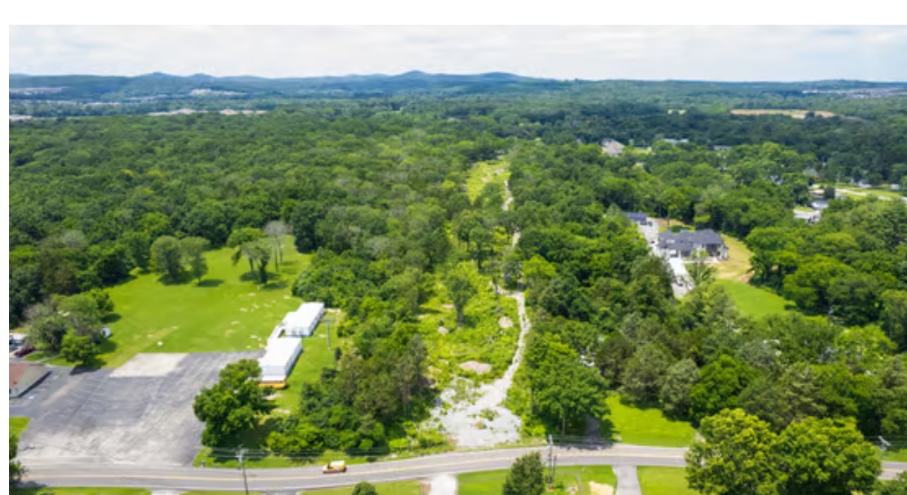 5660 Seminary Road Smyrna, TN 37167 - Photo 5 of 12 an aerial view of residential houses with outdoor space and trees