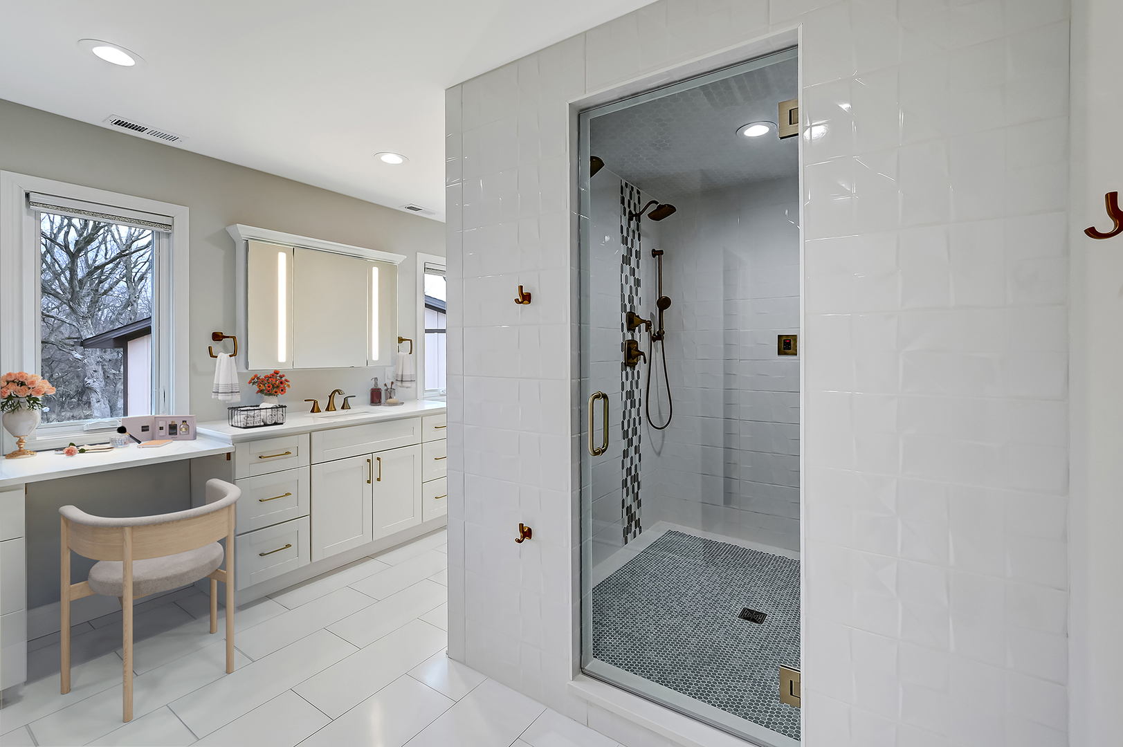3220 Meyers Road Oak Brook, IL 60523 - Photo 15 of 43 a bathroom with a shower sink and mirror
